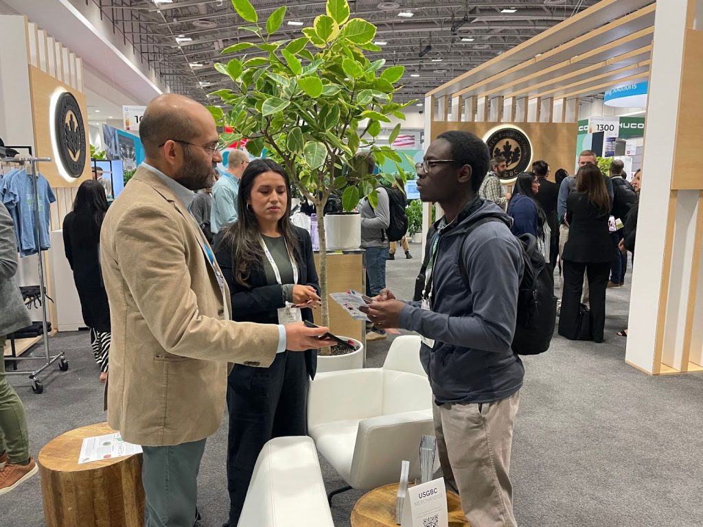 A Clarkson University student interacts with industry professionals at the Greenbuild International Conference and Expo.
